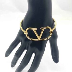 Valentino Bracelet, lightly used shines brand new. Comes with dust bag.